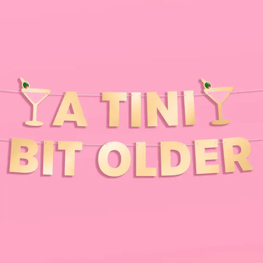 Tini Bit Older Gold Foil Banner